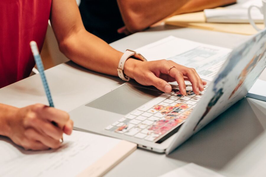 Person typing laptop