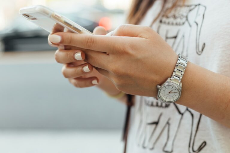 Woman adjusting phone