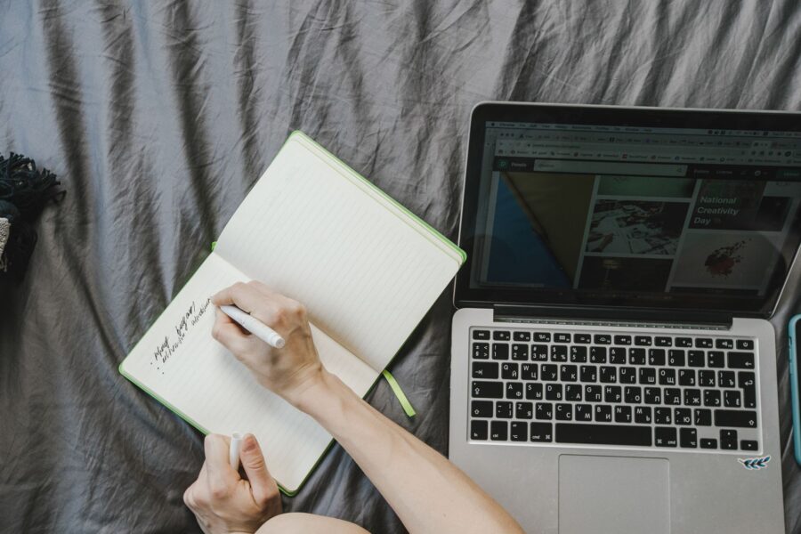 Person writing notebook