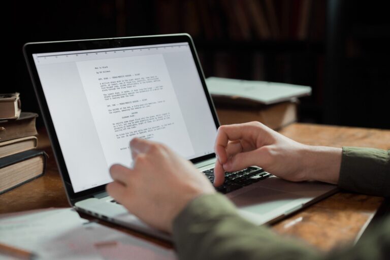 Person editing laptop
