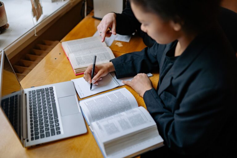 Student taking notes