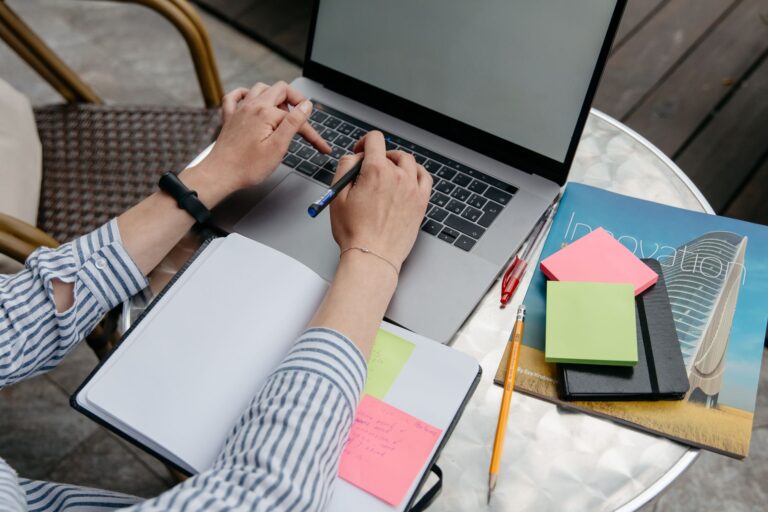 Person typing notes