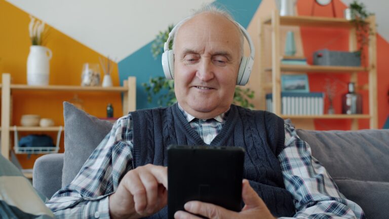 Senior talking smartphone